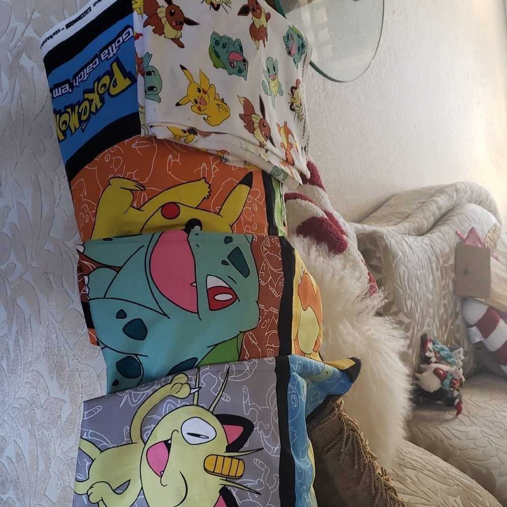 Pokemon 2yd Quilting Fabric - Orange, Blue, Gray.